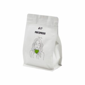 JAMAI CAFE Paní Espresso, zrnková káva pro espresso, bílý sáček s ilustrací ženy se zeleným šálkem.